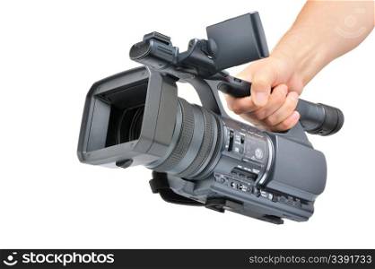 Videocamera in a hand. It is isolated on a white background