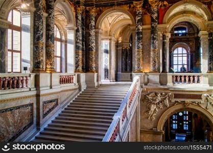 VIENNA, AUSTRIA - November 11, 2015: Wonderful interior of ancient building of Baroque palace ensemble Schloss Belveder with rich decoration from colored marble and gilding in Vienna, Austria.. VIENNA, AUSTRIA - November 11, 2015: Rich decoration of interior palace Schloss Belvedere in Baroque style.