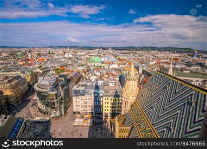 Vienna city skyline, aerial view from St. Stephen’s Cathedral in Austria with blue sky