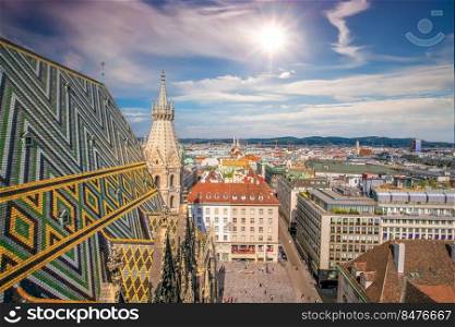 Vienna city skyline, aerial view from St. Stephen’s Cathedral in Austria with blue sky
