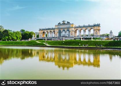 Vienna, Vienna / Austria - 30 04 2013: View on Gloriette building in palace gardens on the top of hill, tourists walking by. Schonbrunn palace Gloriette Vienna Austria travel destination