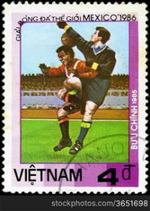 VIETNAM - CIRCA 1985: a stamp printed by VIETNAM shows football players. World football cup in Mexico 1986, circa 1985