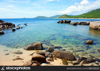 Vietnamese beach at Hang Rai, Phan Rang, Ninh thuan, coastal countryside, amazing with large rock, blue water, beautiful place for Vietnam ecotourism