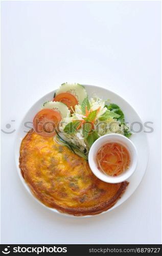 Vietnamese Crepe. A thin crape filled with shrimp, pork, scallion and bean sprout. Served with homemade sauce.