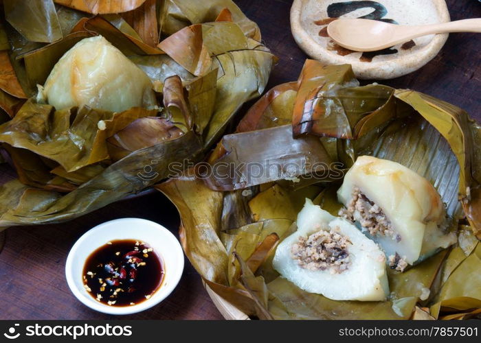 Vietnamese food, Banh Gio or pyramid shaped rice dough dumpling filled with pork, shallot, andwood ear mushroomwrapped in banana leaf, is delicious street food, diet food make from rice flour