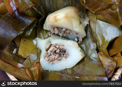 Vietnamese food, Banh Gio or pyramid shaped rice dough dumpling filled with pork, shallot, andwood ear mushroomwrapped in banana leaf, is delicious street food, diet food make from rice flour
