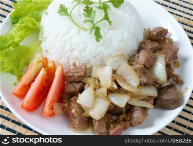 Vietnamese food, bo luc lac, nutrition and delicious eating, beef fry with spice, onion, garlic, eat with salad, tomato, cooked rice