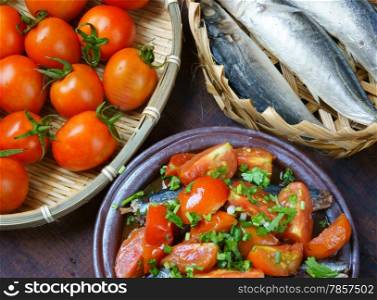 Vietnamese food, braised fish with tomato, a popular dish in Vietnam meal, cheap, tasty, nutrition and fresh raw material, fish stew with fish sauce, sugar season with tomato, spice