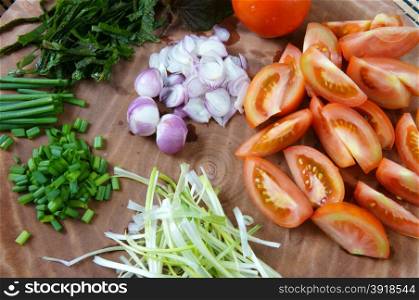 Vietnamese food, bun rieu, a famous dish of Vietnam, raw material as tomato, crab, pork meat, shrimp, salad, scallion, egg, vegetable, shrimp paste, bunrieu is Viet Nam special eating