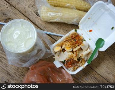 Vietnamese food for breakfast in plastic recycle bag, nylon bag use very popular, but toxic, danger for health, make environment pollution and persistent in long time