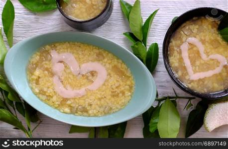 Vietnamese food for dessert, che buoi or grapefruit sweet gruel, a popular sweet soup make from grape fruit slivered rind with green bean, coconut milk and sugar