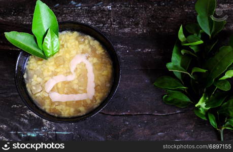 Vietnamese food for dessert, che buoi or grapefruit sweet gruel, a popular sweet soup make from grape fruit slivered rind with green bean, coconut milk and sugar