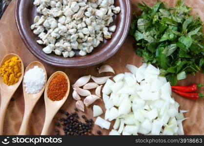 Vietnamese food, mussel fry with rice paper, a speciality of Hue eating, a Vietnam snack, raw material as mussel, laksa leaves, chili, pepper, onion, spice, garlic