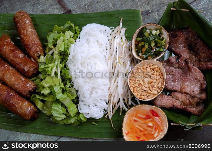 Vietnamese food, spring roll or cha gio, roast meat , a delicious fried food, eat with bun, salad and fish sauce, this also rich calories, cholesterol, fatty food, popular Vietnam eating
