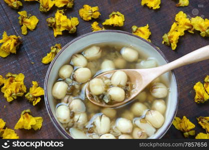 Vietnamese food, sweet lotus seed gruel, ingredients: lotus bean, mung bean, water chestnut and sugar candy. this Vietnam dish for dessert or snack, very delicious, tasty, nutrition, make sleep well