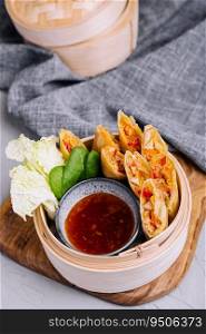 Vietnamese fresh summer rolls filled with prawns, herbs, rice vermicelli and vegetables