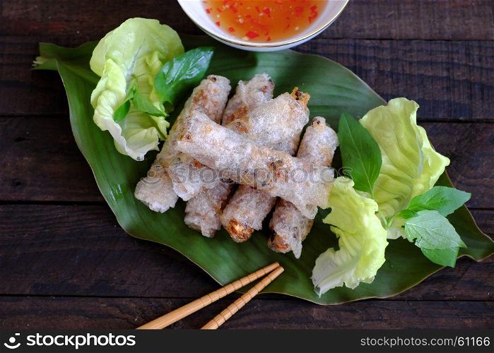 Vietnamese spring roll pastry or cha gio is popular food at Vietnam cuisine, stuffing from meat and wrapper by rice paper, then deep fried, eat with salad and fish sauce