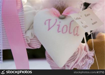 View a cloth heart with the name as a decoration
