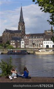 View across the River Meuse to part of the city of Maastricht in southeast Netherlands. Maastricht is an industrial city and capital of the province of Limburg. It is situated on both sides of the River Maas near the Belgian and German borders.
