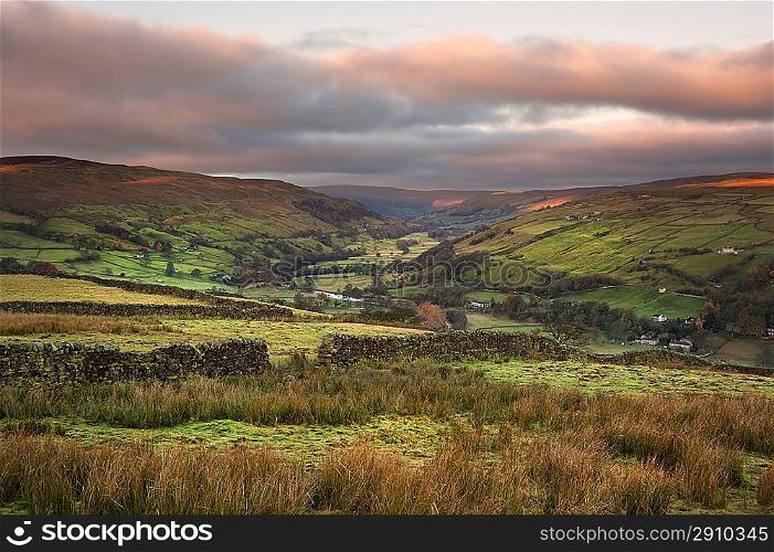 View along Swaledale in Yorkshire Dales National Park during Autumn sunrise