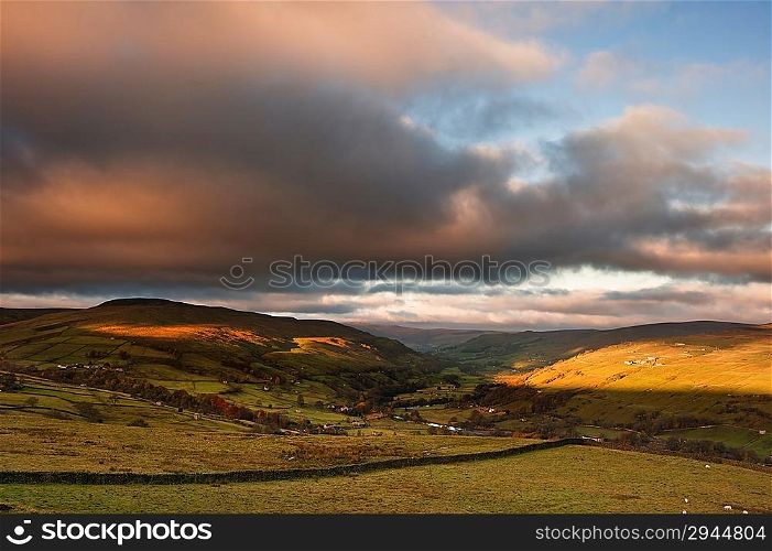 View along Swaledale valley towards Gunnerside in Yorkshire Dales National Park