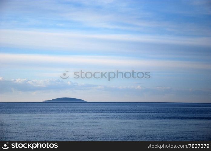 View at a blue island in Baltic Sea. From the swedish island Oland in Sweden