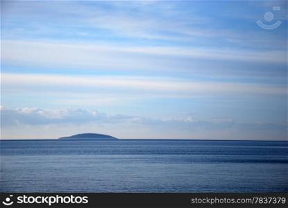 View at a blue island in Baltic Sea. From the swedish island Oland in Sweden