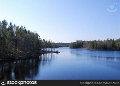 View at a forest lake at the swedish province Smaland