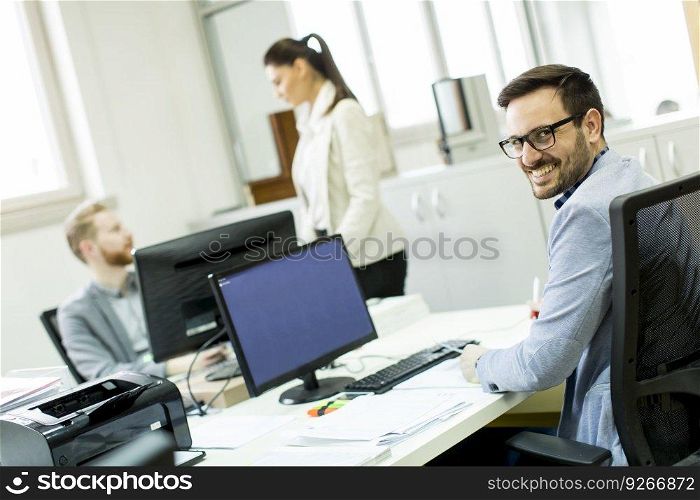 View at Business partners working in modern office