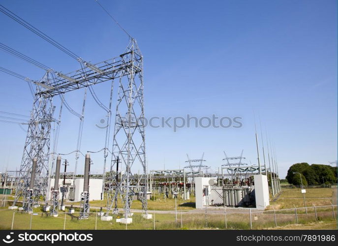 View at electricity installation with blue sky