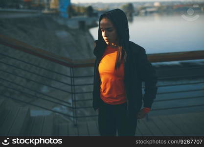 View at prety young woman exercising outside