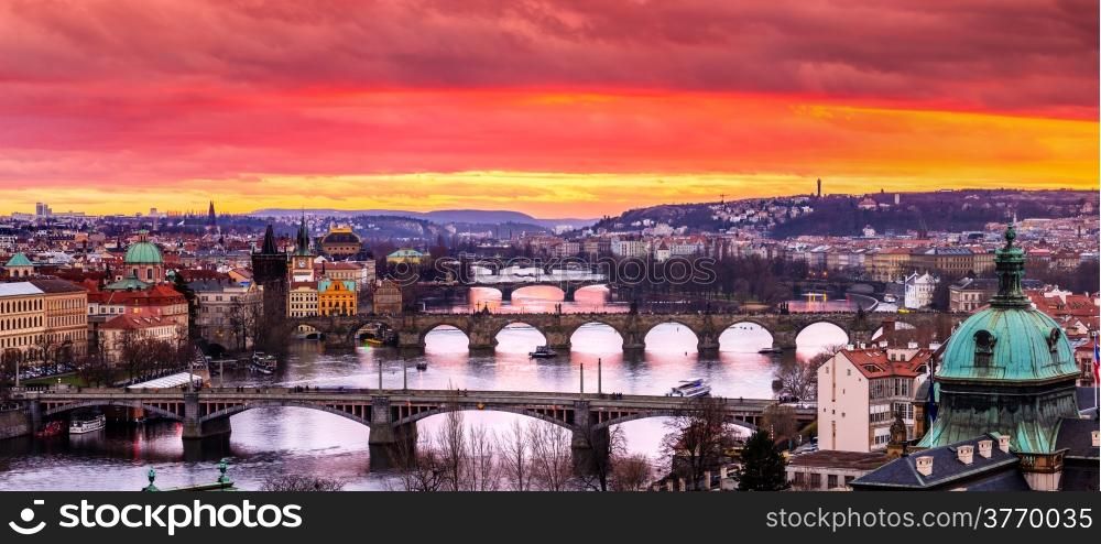 View at The Charles Bridge and Vltava river in Prague in dusk at sunset