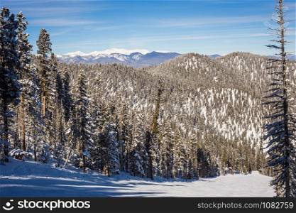 View at the ski slopes piste in the mountains of Angel Fire, New Mexico.