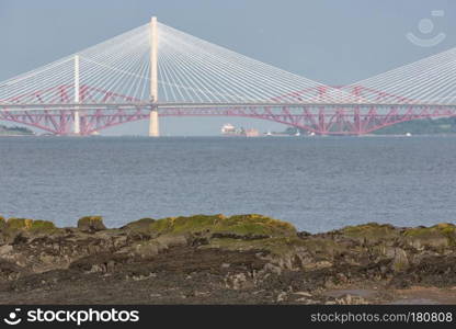 View at three rail and road bridges crossing Firth of Forth in Scotland. View at three bridges crossing Firth of Forth in Scotland