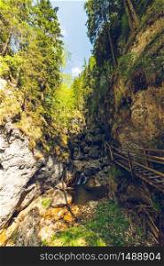 View at waterfalls hiking path in Mixnitz along mountain stream. Tourist spot. Travel destination in Styria Austria. Mixnitz waterfall path along mountain stream. Tourist spot. Travel destination