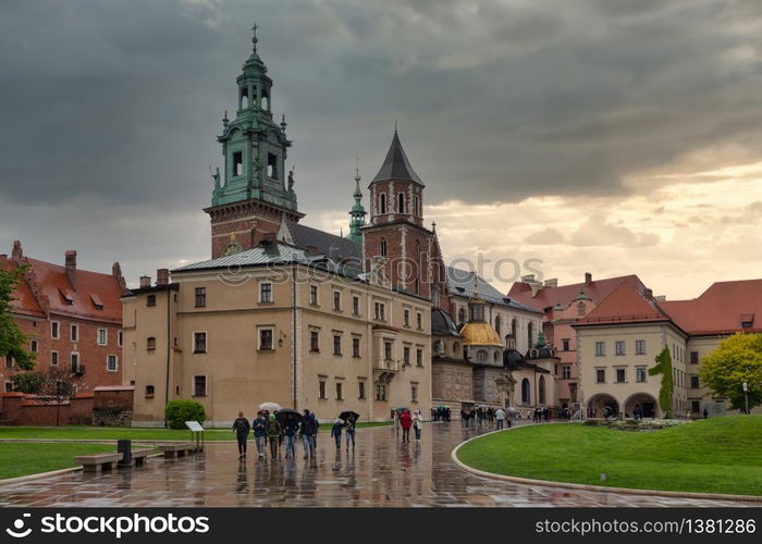 View at Wavel square with medieval buildings during a rainy day in Krakow, Poland. View at Wavel square with medieval buildings in Krakow, Ppland