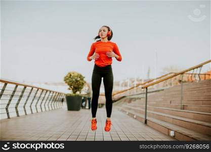View at young woman exercising outside