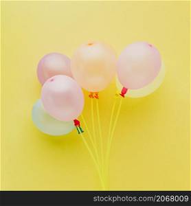 view decoration with balloons yellow background