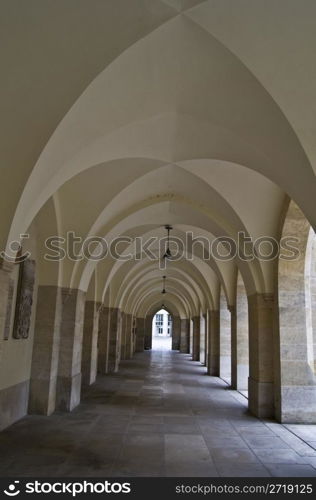 view down a long beautiful and old corridor