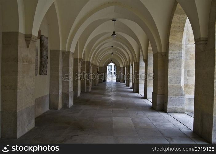 view down a long beautiful and old corridor