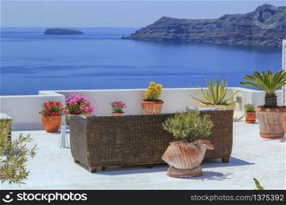 View from a balcony Oia village in the Caldera by day, Greece. View from a balcony at Oia village in the Caldera, Greece