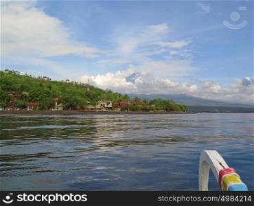 View from boat, lagoon and green coast village. Bali, Indonesia. View from boat, lagoon and green coast village. Bali, Indonesia.