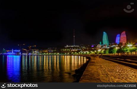 View from Caspian sea shore to the central business district with skyscrapers and tv tower, Baku, Azerbaijan