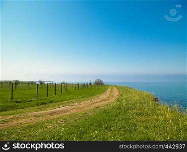 View from cliff on water of Black Sea. Beautiful transparent water of Black Sea, exploration and nature concept, Romania, Dobrogea region.. View from cliff on water of Black Sea.