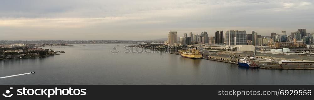 View from Coronado Bridge of the bay and buildings of San Diego at near dusk