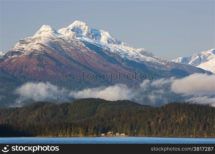 View from Douglas Island of mountains soaring above Juneau, capital city of Alaska;