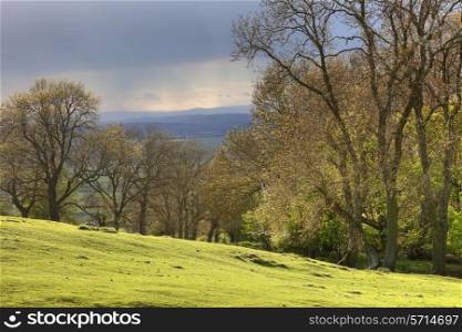View from Dover&rsquo;s Hill near Chipping Campden of approaching rain clouds. Gloucestershire, England.