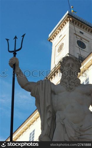 "View from Lviv-City "Rynok Square" on town hall building with fragment of Neptune (sea god) monument (Lvov-City, Ukraine)"