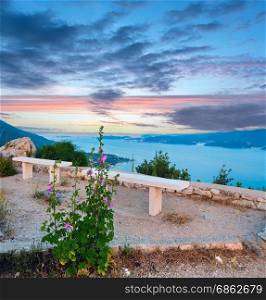 View from observation area on sea sunset picturesque sky and Croatian islands (near Viganj village, PeljeA?ac peninsula, Croatia) and Korcula village.
