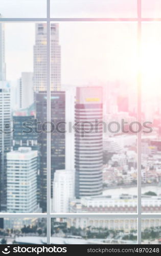 View from office window. Sunset view from office window view of modern Singapore downtown skyscrapers